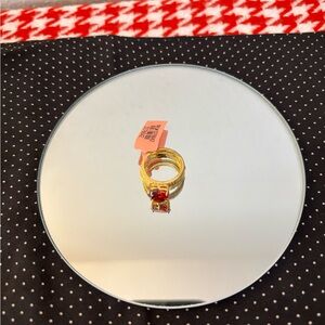 Ring with Heart Shaped Red Stone